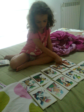 Emi with her cards